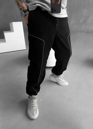 Стильные брюки со светло-отражающей лентой2 фото