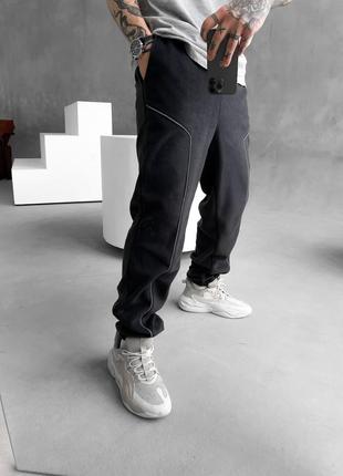 Стильные брюки со светло-отражающей лентой4 фото