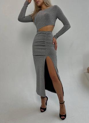 Стильна жіночна сукня міді облягаюча з асиметричним вирізом і розрізом на нозі люрекс2 фото