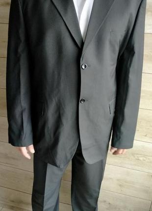 Діловий костюм, чорний в смужку3 фото