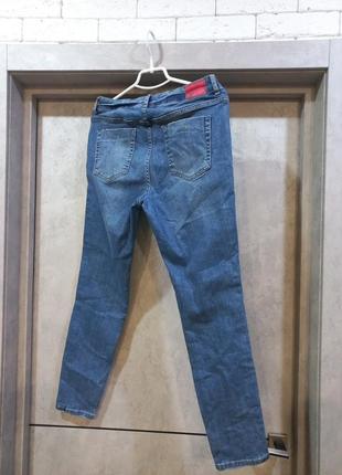 Стильные,фирменные, качественные джинсы синие со вставками8 фото