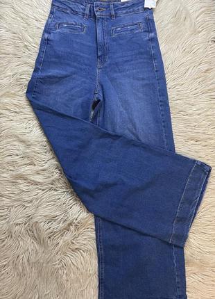 Джинсы новые