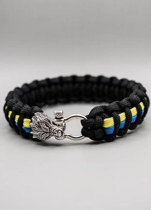 Браслет из паракорда кобра на декоративной застежке волк з патриотической лентой