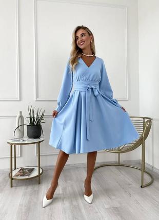 Стильна елегантна блакитна сукня на запах1 фото