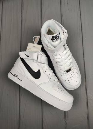 Кроссовки зимние nike air force 1 high winter white black2 фото