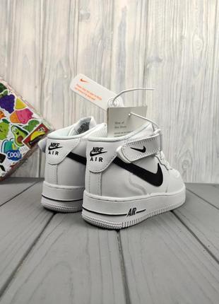 Кроссовки зимние nike air force 1 high winter white black7 фото