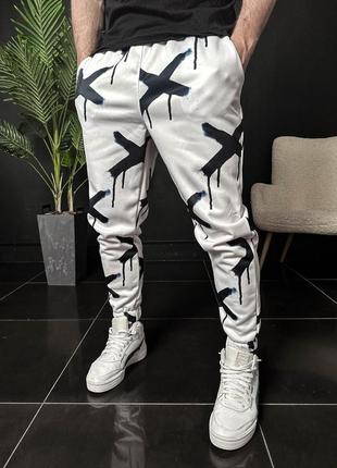 Спортивні штани утеплені з принтами білі6 фото