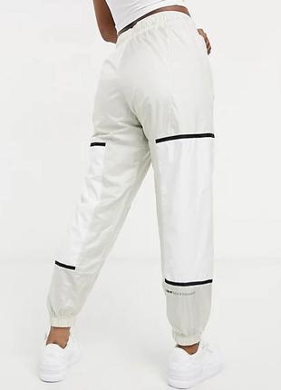 Оригинальные штаны nike «woven pants light bone»2 фото