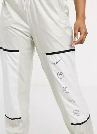 Оригинальные штаны nike «woven pants light bone»3 фото