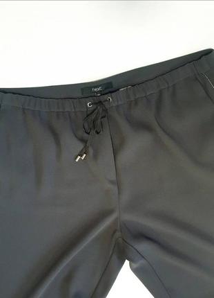 🔥красивые темно-серые (трех даже до цвета хаки) широкие брюки с молниями внизу. по бокам лампасы из серебряной цепочки2 фото