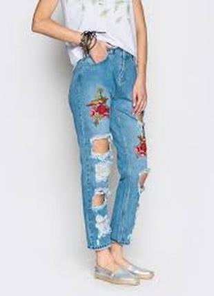 Джинсы джинси женские  размер 44 / 10 не стрейч новые рваные1 фото