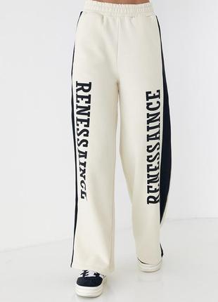 Теплые трикотажные штаны с лампасами и надписью renes saince - кремовый цвет, l (есть размеры)1 фото
