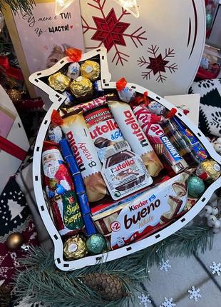 Подарочный бокс с сладостями в форме мешочка.