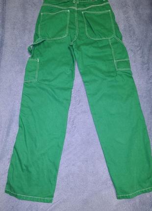 Зелені джинси з білою строчкою