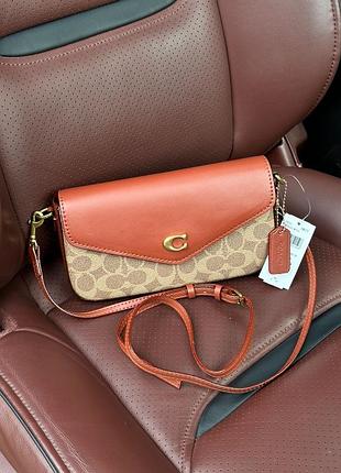 Жіноча сумка coach women's wyn cross body bag