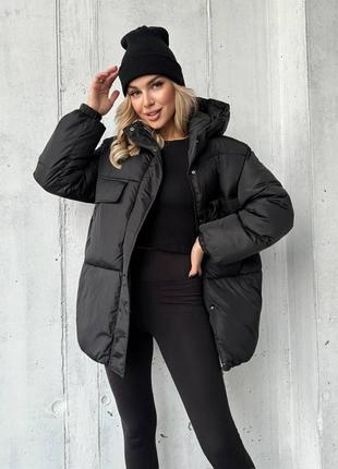 Женская удобная красивая теплая черная удлиненная куртка на евро зиму 2024 года.4 фото