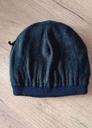 Мужская вязаная шапочка с отворотом на микрофлисе
шапка средней плотности
не толстая
размер универсальный
цвет темно-синий2 фото