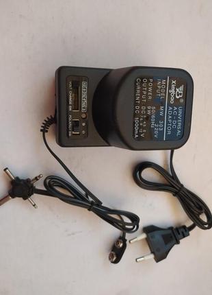 Новые зарядное устройство 1.5, 3, 4.5, 6, 7.5, 9, 12в.   блок питания адаптер