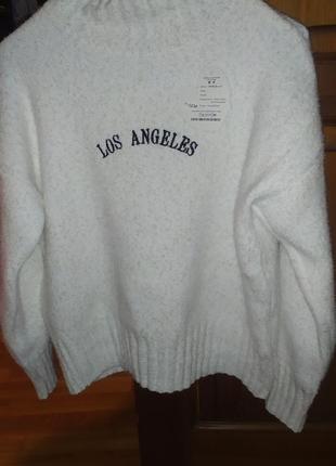 Джемпер молочного кольору