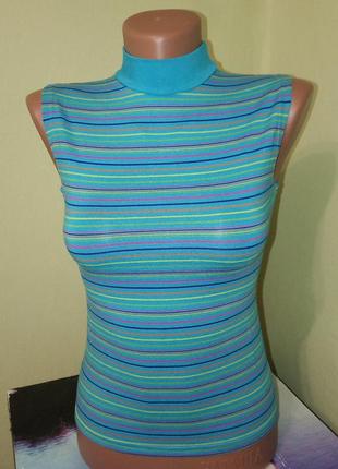 Майка американка без рукавов с высоким горлом на девочку подростка. цвет голубой