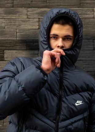 Пуховик nike у темно-синьому8 фото