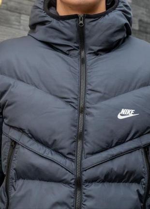 Пуховик nike у темно-синьому7 фото