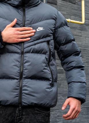 Пуховик nike у темно-синьому4 фото