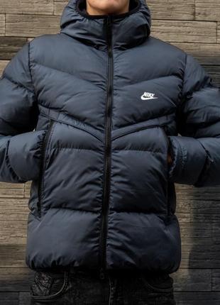 Пуховик nike у темно-синьому9 фото