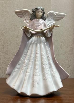 Фарфоровая статуэтка lladro «ангел рождественский певец».1 фото