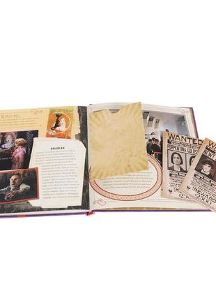 Книга j.k. rowling's wizarding world. the dark arts. a movie scrapbook4 фото