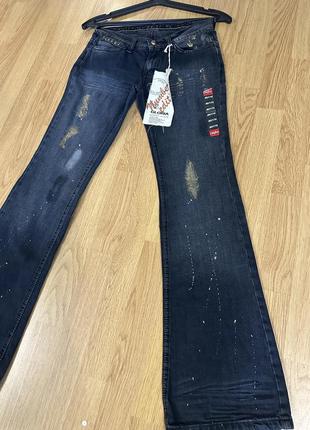Нові джинси з потертостями та фарбою3 фото