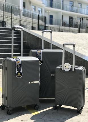 Качественный чемодан из полипропилен,модель 374,прорезиненный,надежная,колеса 360,кодовый замок,туреченя3 фото