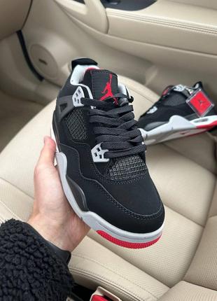 Стильні жіночі зимові кросівки  nike air jordan 4 retro black red fur чорні на хутрі3 фото