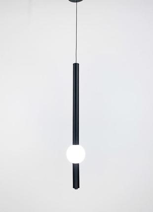 Дизайнерский вертикальный светильник в черном каркасе.8 фото