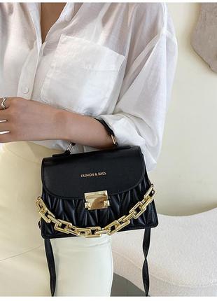 Маленькая стильная женская сумка клатч через плечо черного цвета4 фото