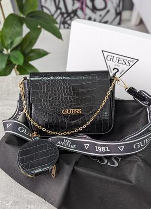 Жіноча сумка кроссбоди рептилія guess сумка через плече чорний колір1 фото