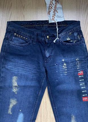 Нові джинси з потертостями та фарбою9 фото