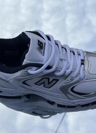 Низкие белые кроссы new balance 5303 фото