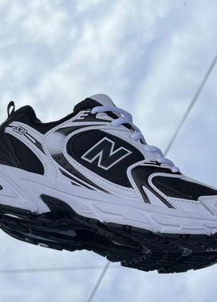 Чорно білі низькі утеплені кроси new balance 530