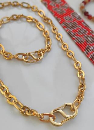 Кольє та браслет-ланцюжок в золотому кольорі зі стильними замками3 фото