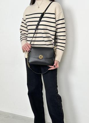 Черная женская сумка среднего размера