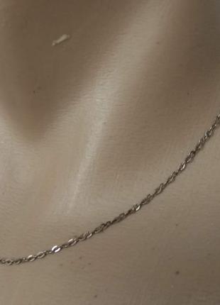 Цепочка на шею 42 см серебристого цвета тонкое плетение цепь на шею1 фото