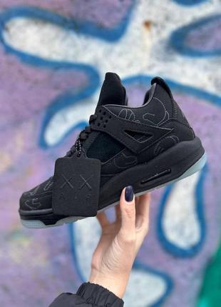 Стильные кроссовки nike air jordan 4 retro kaws black premium чёрные унисекс 36-45 р