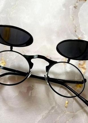 Круглі сонцезахисні окуляри ,чорні з відкидними лінзами.4 фото