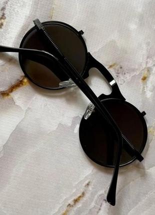 Круглые солнцезащитные очки,черные с откидными линзами.5 фото