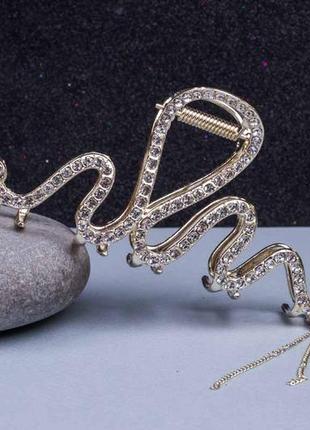 Заколка краб металлический золотистая змея с подвесками1 фото