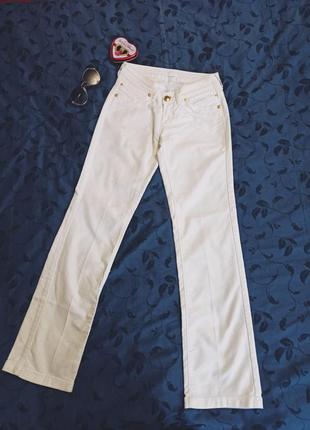 Білі джинси versace