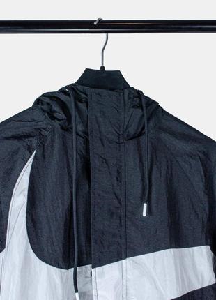 Куртка вітровка жіноча / чоловіча чорна з капюшоном nike5 фото