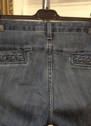 Розкльошені донизу класні джинси.7 фото