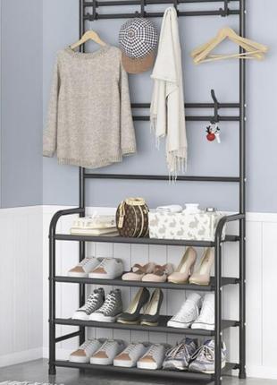 Універсальна вішалка для одягу new simple floor clothes rack size 60x29.5x151 см чорна3 фото